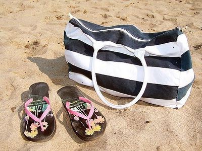 Hur man packa en beach bag. Köp din strand väska.